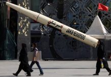 Iran fires ballistic missiles at US base as five-hour Hormuz battle sends oil to four-week high