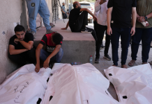 Israel’s latest strikes kill a dozen people in Gaza, including police officers